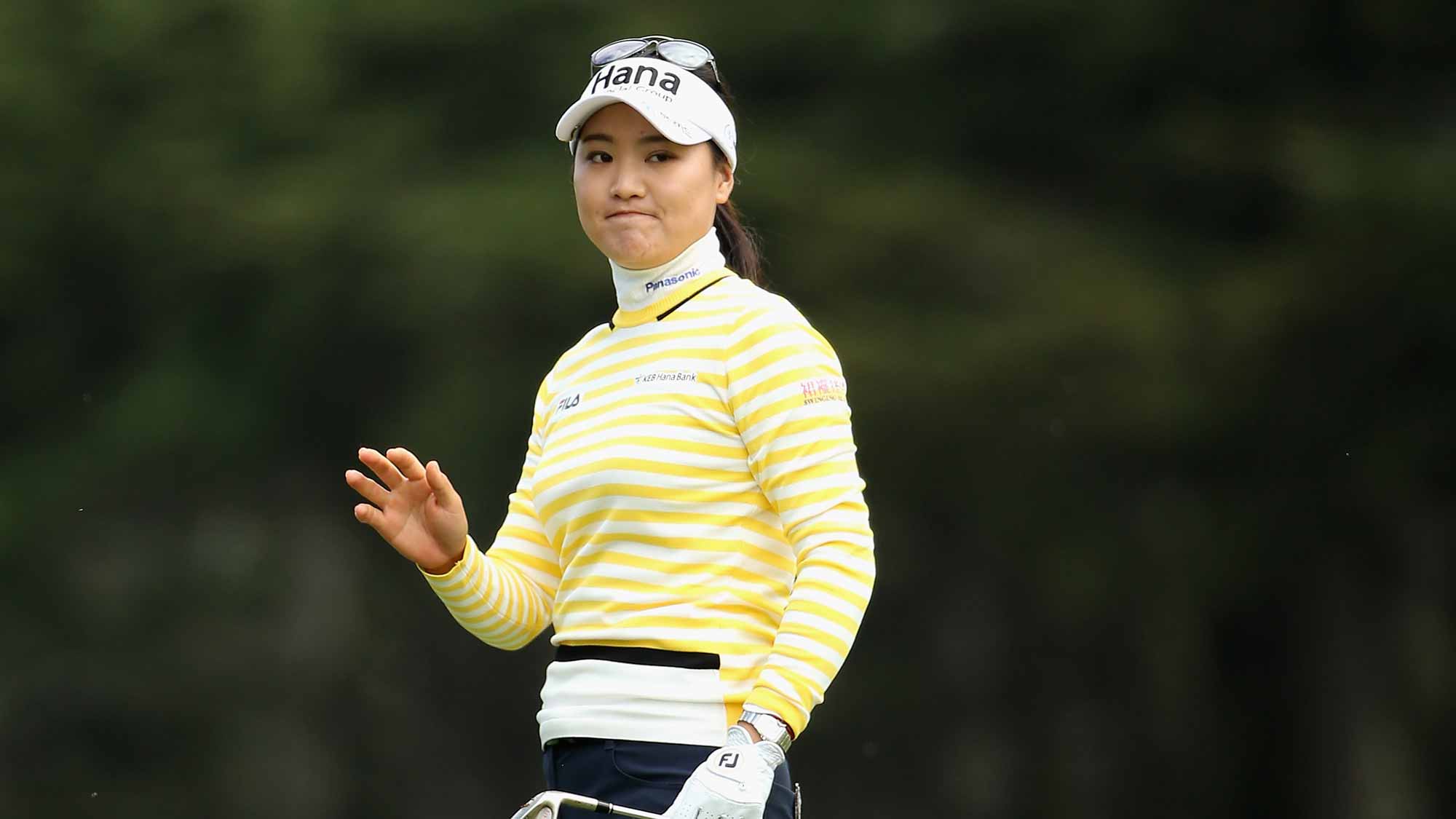 So Yeon Ryu of South Korea waves to the crowd after she hit her third shot on the ninth hole during round one of the Swinging Skirts LPGA Classic at Lake Merced Golf Club