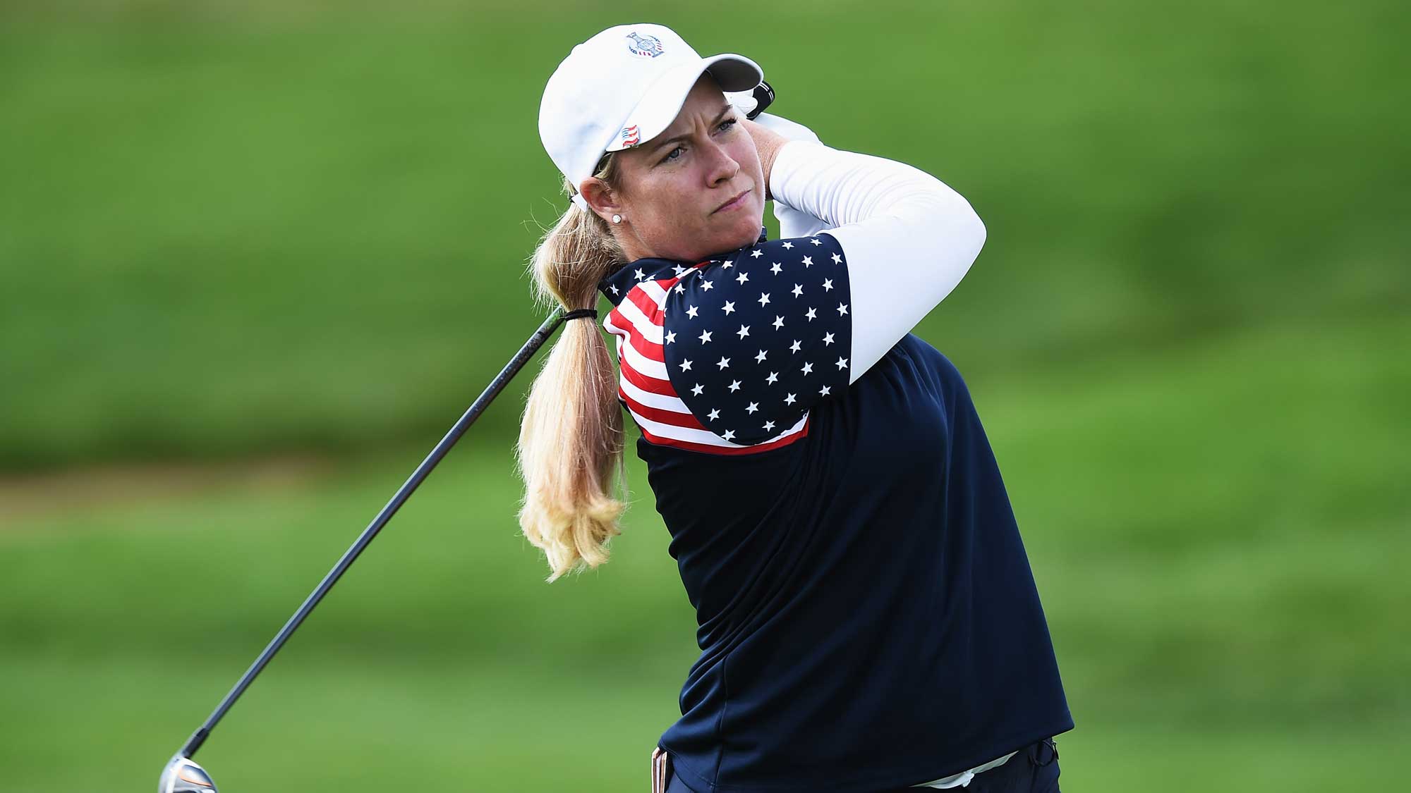 Brittany Linicome of team USA plays a shot during the singles matches of the 2015 Solheim Cup