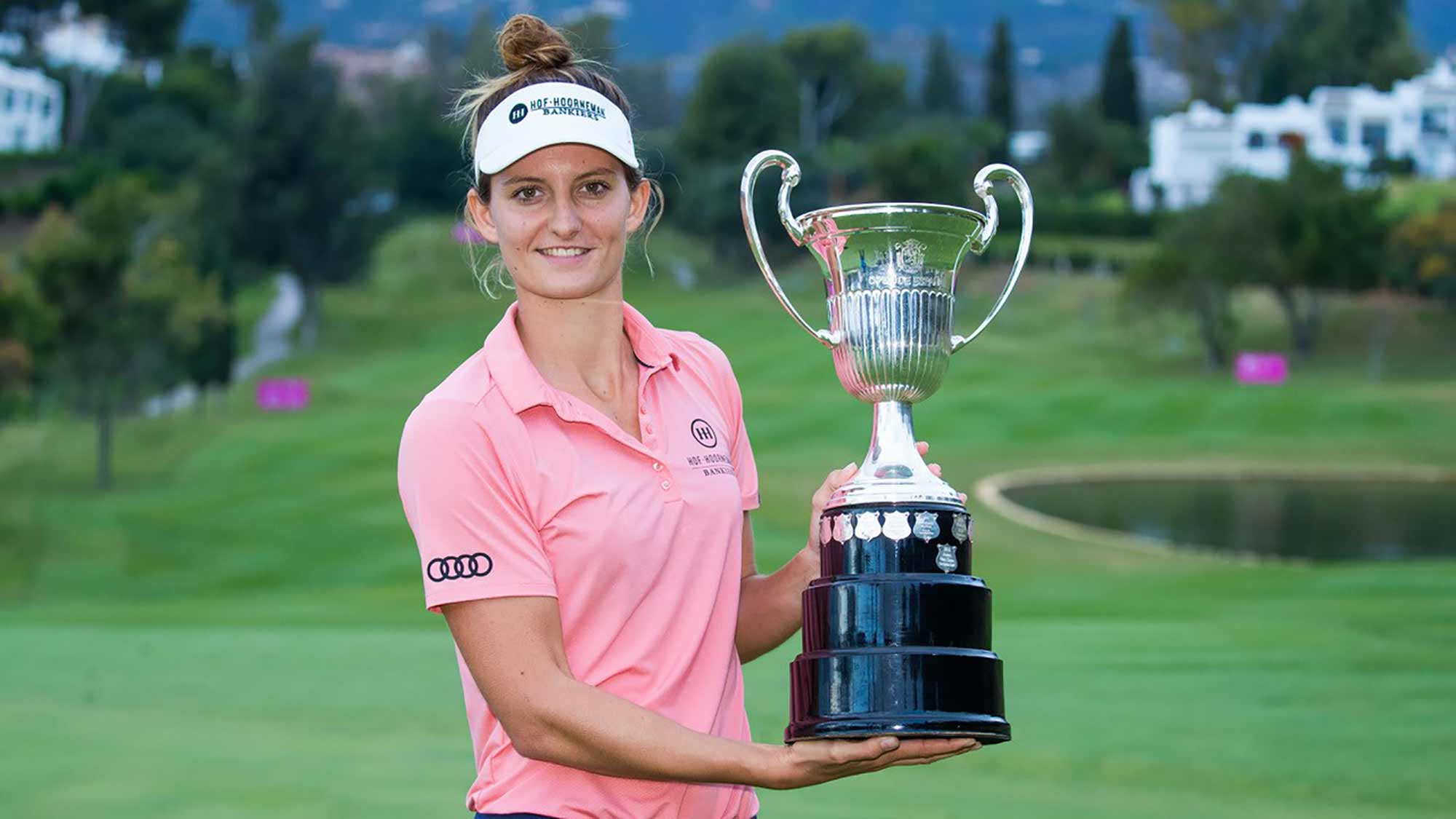 Anne van Dam poses with the trophy after successfully defending her title at the Andalucia Costa del Sol Open de Espana on the Ladies European Tour