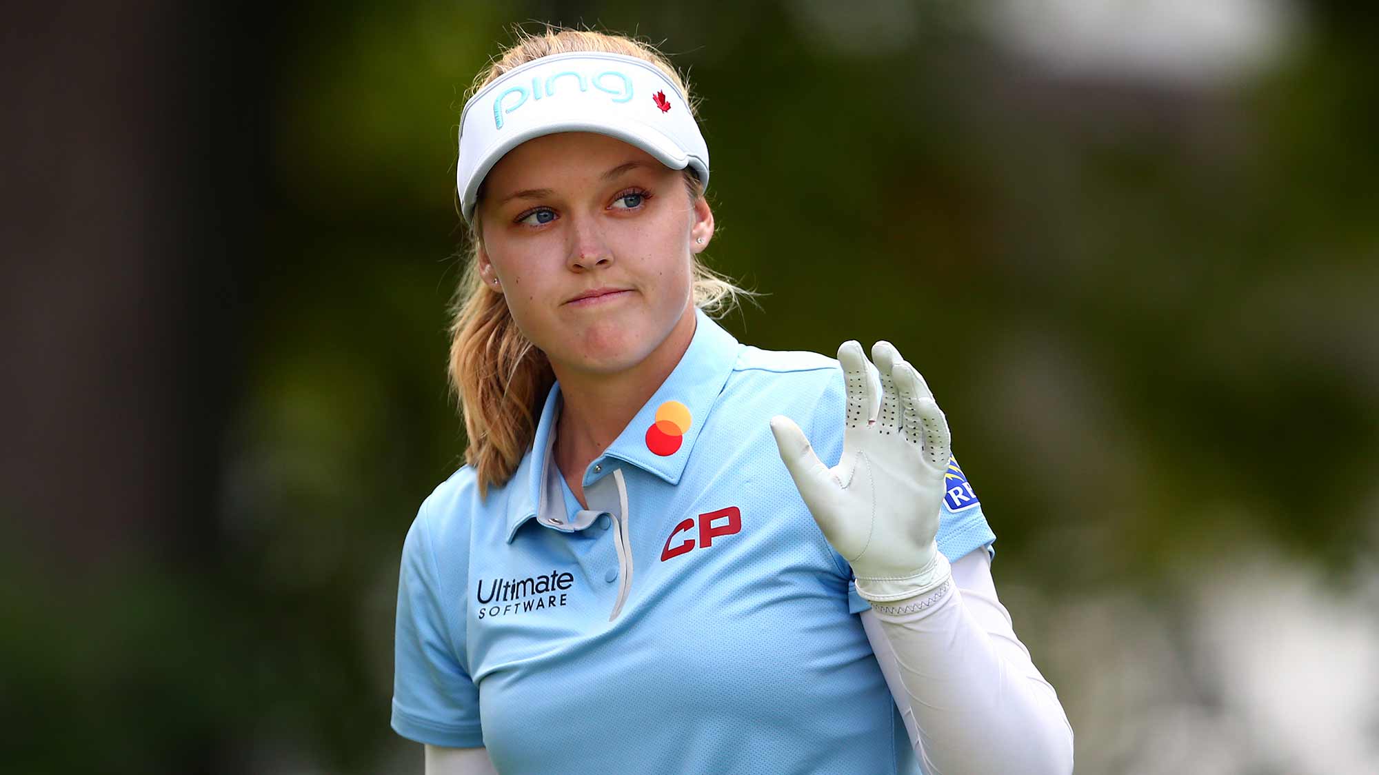 Brooke Henderson of Canada acknowledges the crowd prior to teeing off on the 1st hole during the third round of the CP Women's Open at Magna Golf Club on August 24, 2019 in Aurora, Canada