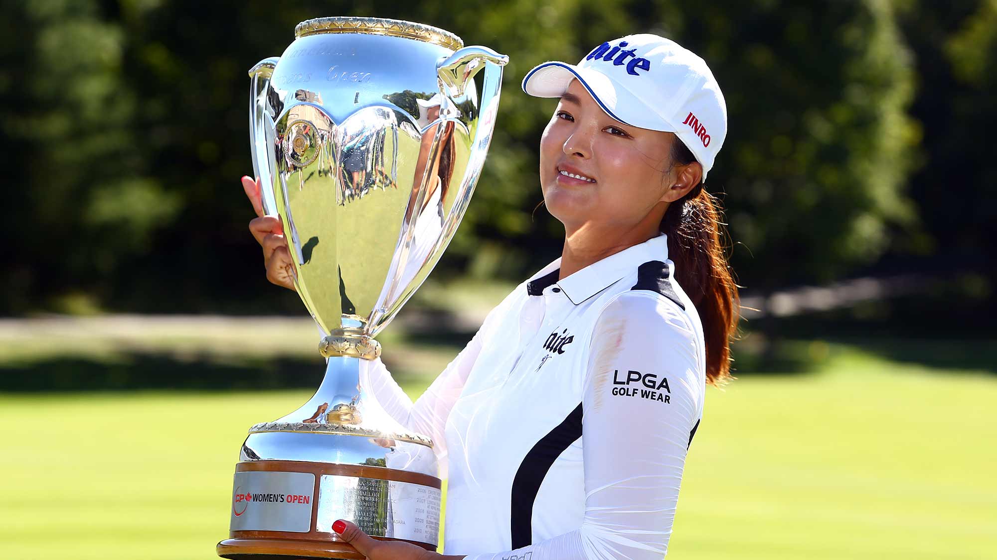 Jin Young Ko of Korea poses with the CP Women's Open Championship Trophy following the final round at Magna Golf Club on August 25, 2019 in Aurora, Canada