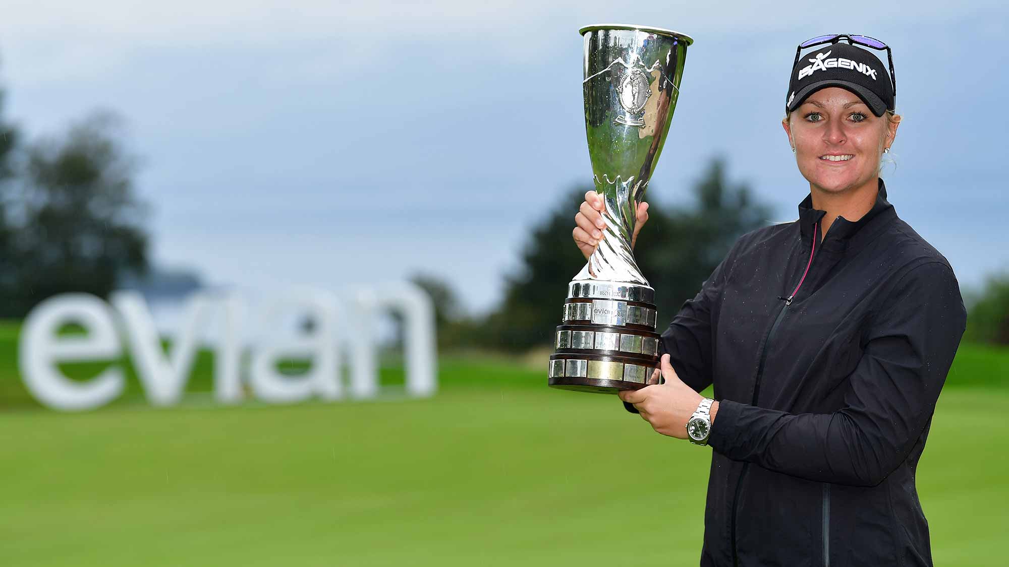 Anna Nordqvist of Sweden hoists the trophy after winning the Evian Champion...